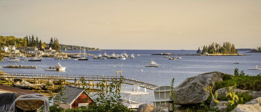 Boothbay Harbor at golden hour from the lawn